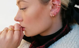 Scream Pretty ear party with multiple piercings