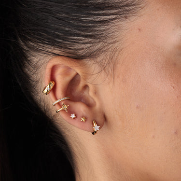 Sparkling Star hoop earring worn in lobe piercing, also perfect for helix and cartilage piercings