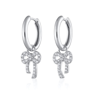silver bow charm hoop earrings ideal for your earlobe piercing