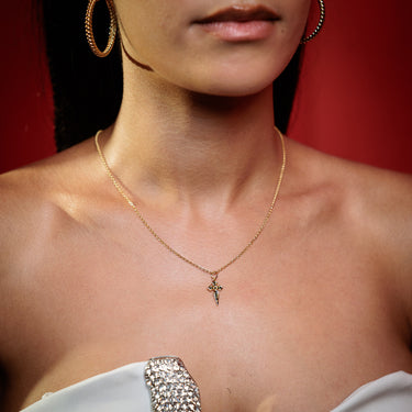Gold Cross Pendant Necklace with Black Nano Stones on Model