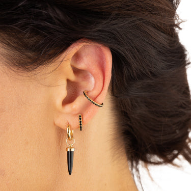 large hoop earring worn in conch piercing
