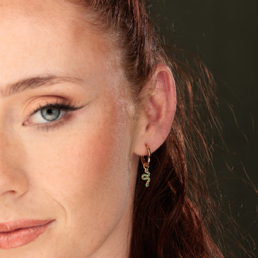 Emerald Green Snake Charm Hoop Earrings in Ear Lobe Piercing