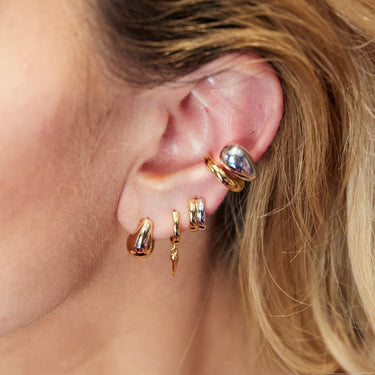 Mixed Metal Silver & Gold Huggie Earrings in a curated earring stack