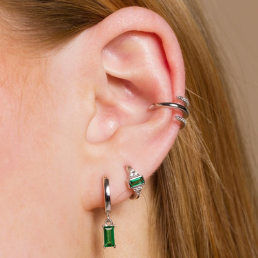 silver green audrey single huggie in 2nd lobe piercing, or cartilage piercing