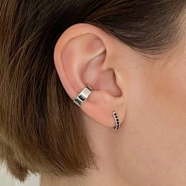 Huggie worn in first lobe piercing. Also perfect for helix and other cartilage piercings