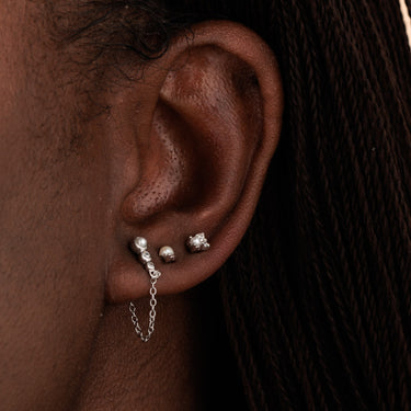 Silver Pearl Chained Stud Earring & two Pearl Flat Back Earrings in Earlobe