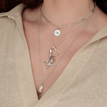 Silver disco ball, lightning bolt and star charm on charm collector necklace