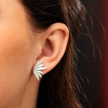 Silver Phoenix Stud Earrings in Earlobe Piercing