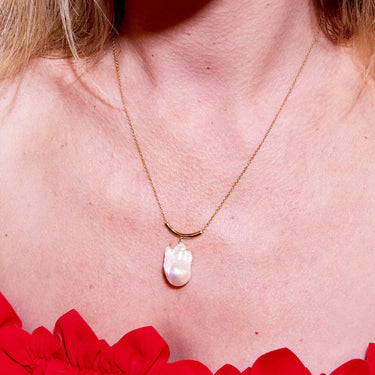 Close Up of Gold Statement Pearl Necklace