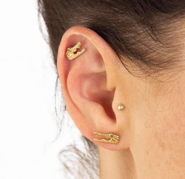 Woman Wearing Gold Crocodile Stud Earrings with Green Stones | Alligator Studs