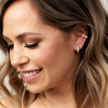 Pearl Gold Huggie Hoop Earrings on model