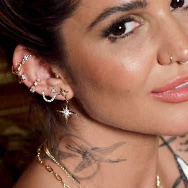 Woman Wearing Gold Tennis Chain Double Stud Earring | Connected Stud Earring
