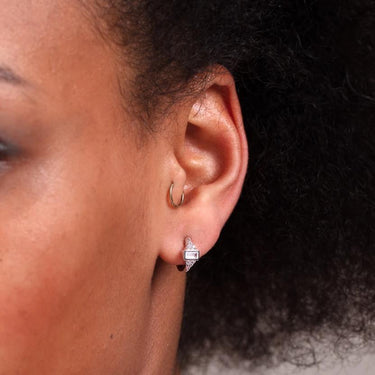 Audrey Silver Huggie Hoop Earrings in ear