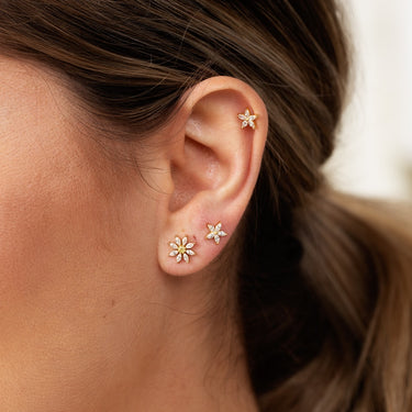 Hanna Martin Wearing Gold Sparkling Flower Stud Earrings | Clear Stone Flower Studs