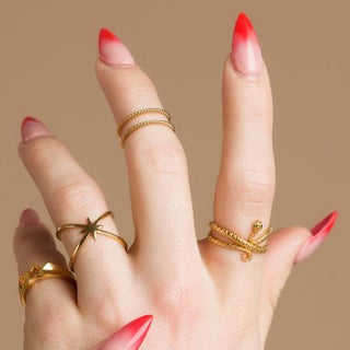 Adjustable rings in silver and gold by Scream Pretty