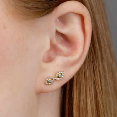 Woman Wearing Gold Evil Eye Stud Earrings | Stud Earrings with Evil Eye Symbol