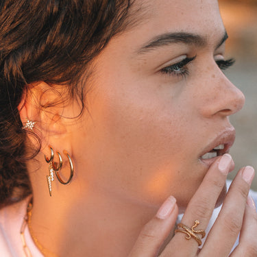 large huggie hoop earring perfect for lobe or conch piercings on model