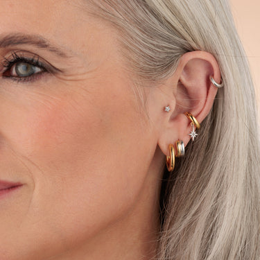 Mixed metal ear cuff earring with star dangle. no piercing required.