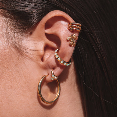 Lime green Opal ear cuff earring worn at conch placement. Ni piercing required