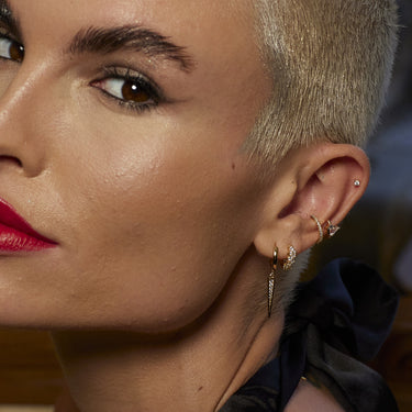 Gold Classic Clear Stone Stud Earrings Worn in Cartilage Ear Piercing