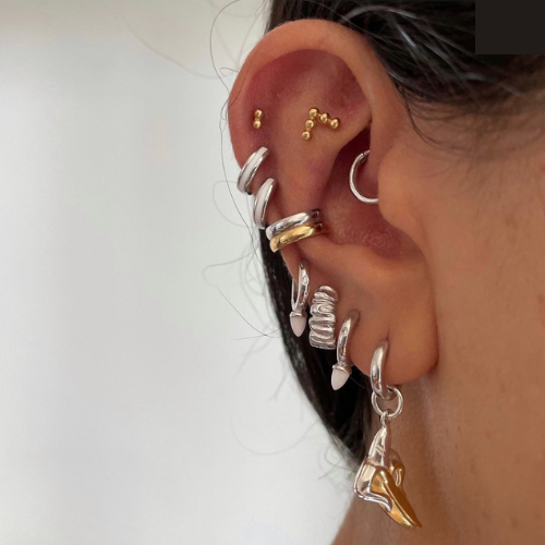 Curate Your Ear Stack with Scream Pretty Earrings in Silver & Gold