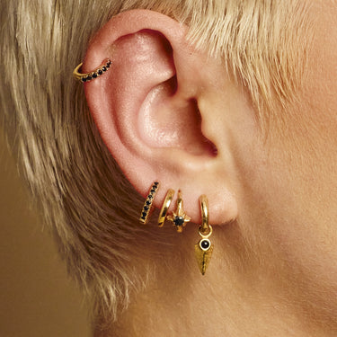 Black Onyx Shield Charm Hoop Earrings shown on model in lobe piercing