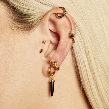 black star hoops earring worn in cartilage and lobe piercings