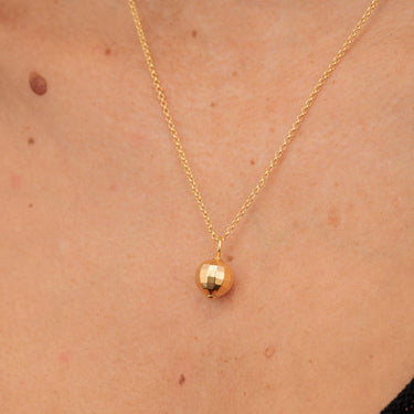 Gold Disco Ball Charm Necklace worn on model