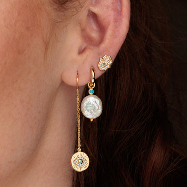 Gold Evil Eye Threaders, Pearl Charm Hoops and Gold Fatima Hand Stud Earrings in Ear Stack