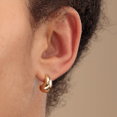 Woman Wearing Gold Teardrop Stud Earrings | Chunky Teardrop Studs