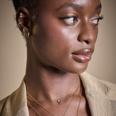 Gold Rebel Necklace with Curated Ear on Model