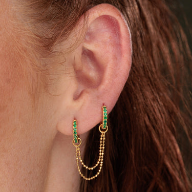 Gold emerald Green CZ Double Huggie Earring with Twin Chain Connector in multi earlobe piercing