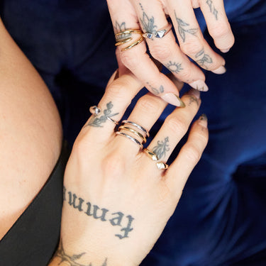 Woman Wearing Mixed Metal Triple Band Ring | Three Band Silver and Gold Ring