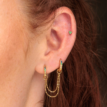 Gold Rainbow Double Huggie Earring with Twin  Chain Connector worn in first and second ear lobe piercing