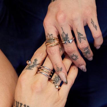 Woman Wearing Silver Rebel Open Ring | Silver Geometric Ring with Clear Stones