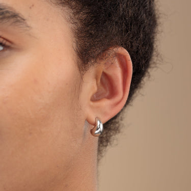 Woman Wearing Silver Teardrop Stud Earrings | Chunky Teardrop Studs