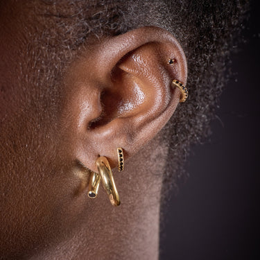 Gold Open Hoop Single Earring with Black Stones in Ear Lobe Piercing