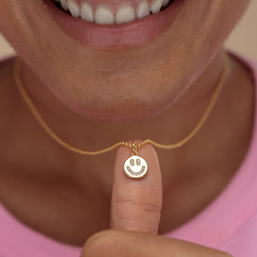 Gold Smiley Face Charm on Necklace | Scream Pretty