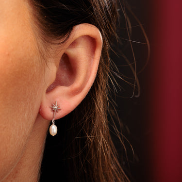 Silver Star Stud Earrings with Pearl Drop in Earlobe Piercing