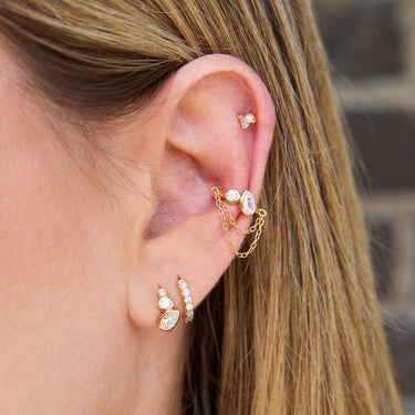 Close-Up of Toi Et Moi Huggie Earrings and Ear Cuff with Flat Back and Huggies