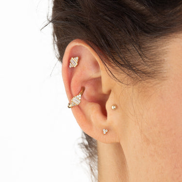 Woman Wearing Gold Sparkling Trinity Stud Earrings | Dainty Clear Stone Stud Earrings