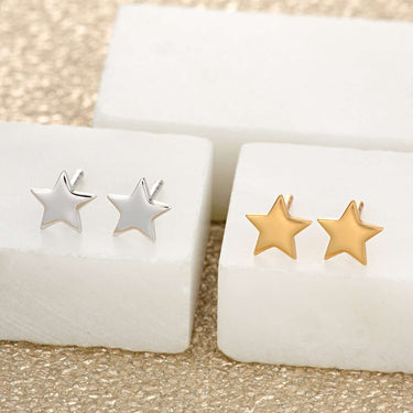Tiny Star Stud Earrings  earrings by Scream Pretty